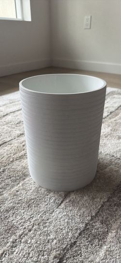 white restroom trash can