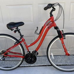 Red Schwinn Voyageur 21 hybrid bicycle - like new 