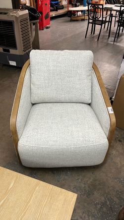 Nieve Upholstered Swivel Barrel Chair