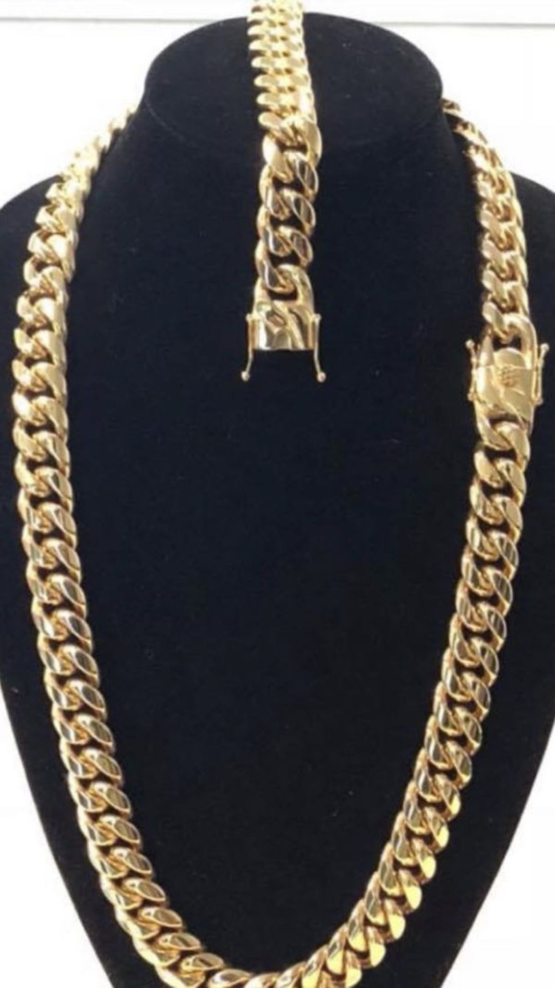 New 14 k yellow gold Cuban link chain and bracelet