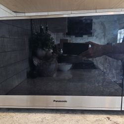 Panasonic 24 in. Width 2.2 cu. ft. 1250 Watt Countertop Microwave in Stainless Steel with Sensor Cooking