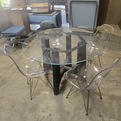 Round Table  Glass And Clear Chairs