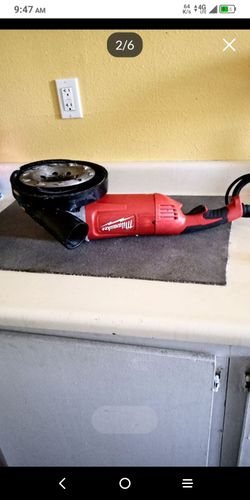 Milwaukee 7-9 inc corded angle grinder with diamond disc and shield dust protector like new