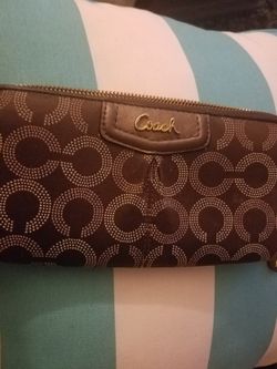 Brown Coach wallet in mint condition pink inside