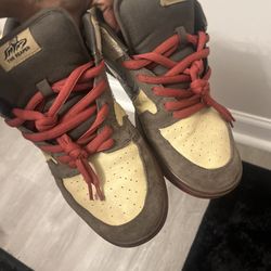 Custom Sneakers With Skulls Design And Red Shoe Laces