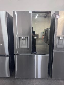 Home package: glass-panel fridge + dark gas laundry
