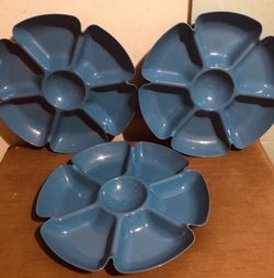 Three large blue plastic party trays