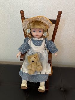 Porcelain doll with Rocking chair
