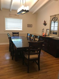 Dark Wood Dining Table with 8 Chairs