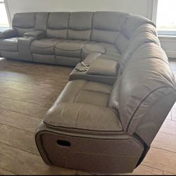 Labor Day sale now. Madrid gray leather reclining sectional only $1499. Easy finance option. Same day delivery.