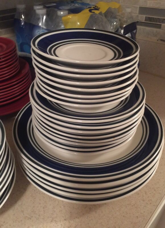 5 large plates, 8 salad plates, 8 small side plates, 7 small bowls