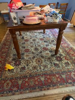 Rug and formal dining table and chairs