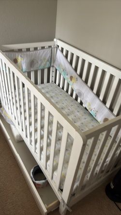 White Wooden Baby Crib with Bedding