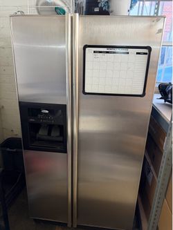 Whirlpool Side-by-Side Refrigerator – $50