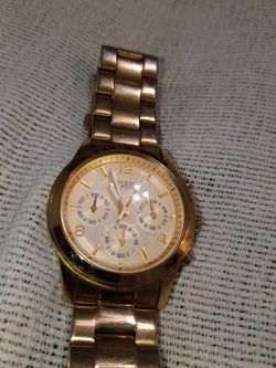 gold guess watch 100m 330ft