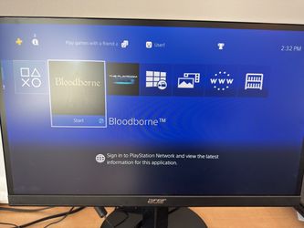 PS4 Pro with controllers and games