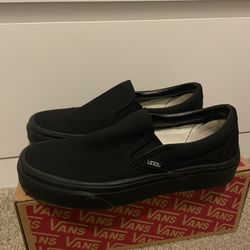 Vans black slip on