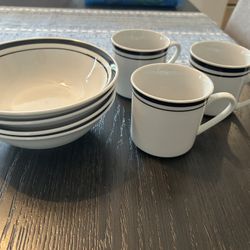 . Dinnerware set; 4 bowls, 3 mugs, 4 dinner plates and 4 dessert plates 