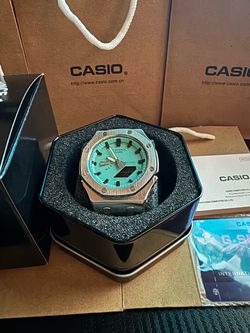Casio G-Shock Watch Teal Dial Silver Case