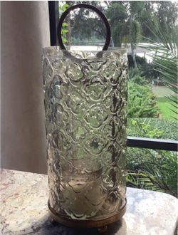 Glass Lantern
21' tall glass lantern
Metal base/ handle