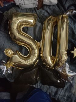 "50" gold/ black balloon