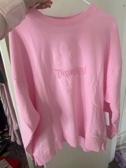 Disney Crewneck pink sweater size LARGE NEW W TAGS