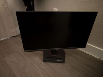 Asus Rog monitor and a quick charger stand Razer for PS5 controller