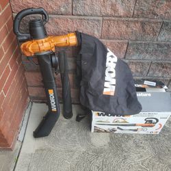 WORKS ELECTRIC CORDED BLOWER/ VACUUM WITH COLLECTION BAG IN LIKE NEW CONDITION
