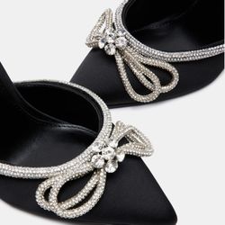 Black bow heels 