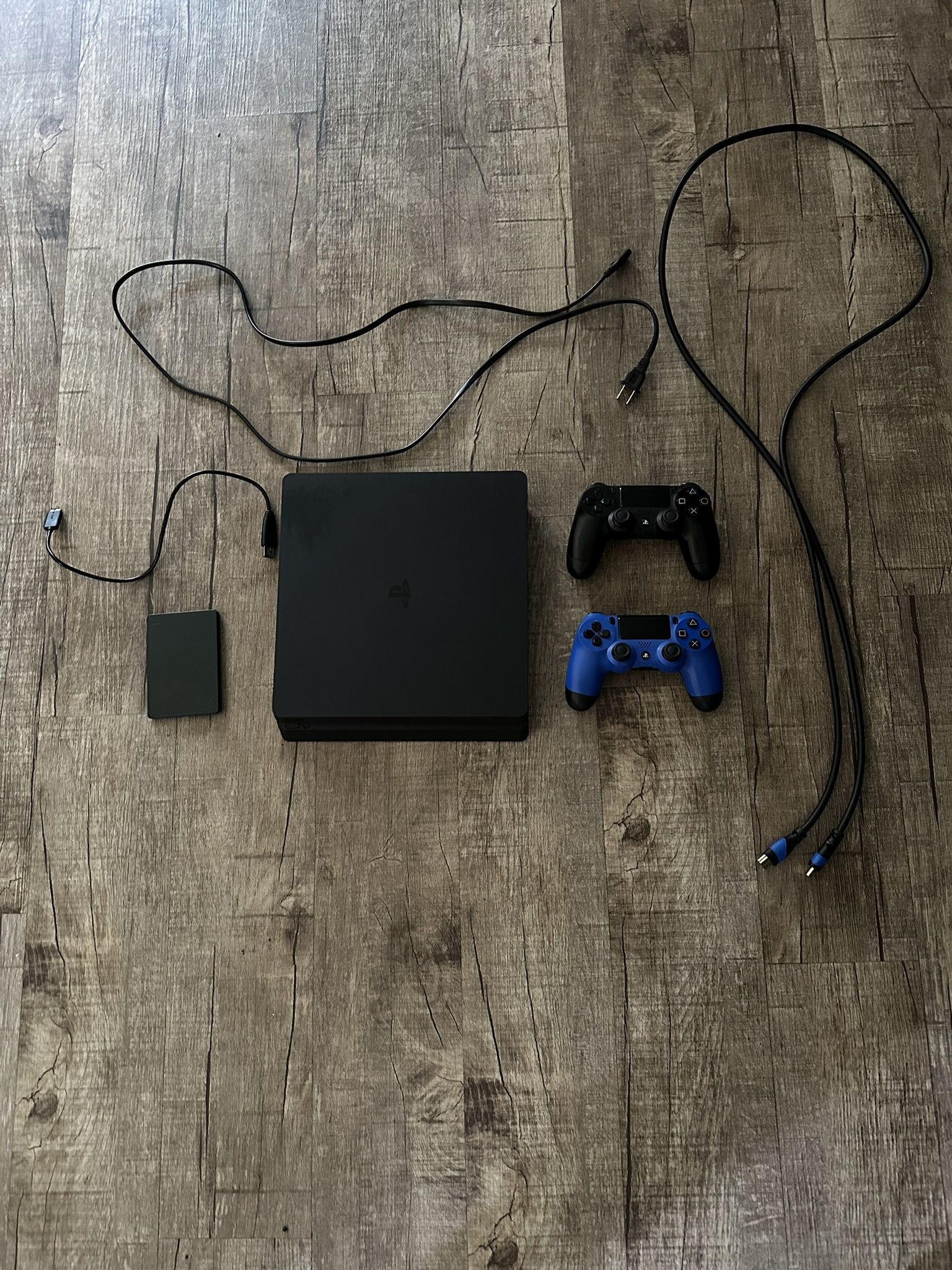 PlayStation 4 Slim & 2 or more controllers 500GB With Extra Memory.