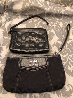 Two authentic coach wristlets.