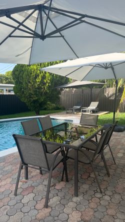 Outdoor table and 6 chairs with hole for the umbrella