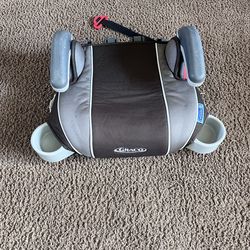 Reliable Graco backless booster car seat. Has two cupholders for drinks or snacks. Easy to move between cars. Great for older kids.
