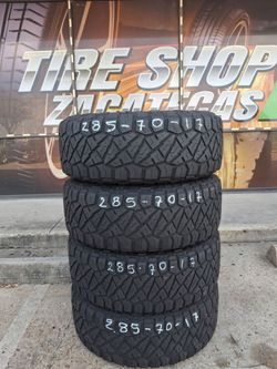 Set 285/70/17. NITTO RIDGE GRAPPLER.  FREE INSTALL AND BALANCE