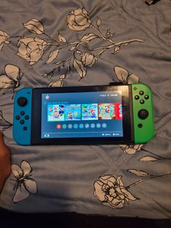 Nintendo Switch with Blue and Green Joy-Cons
