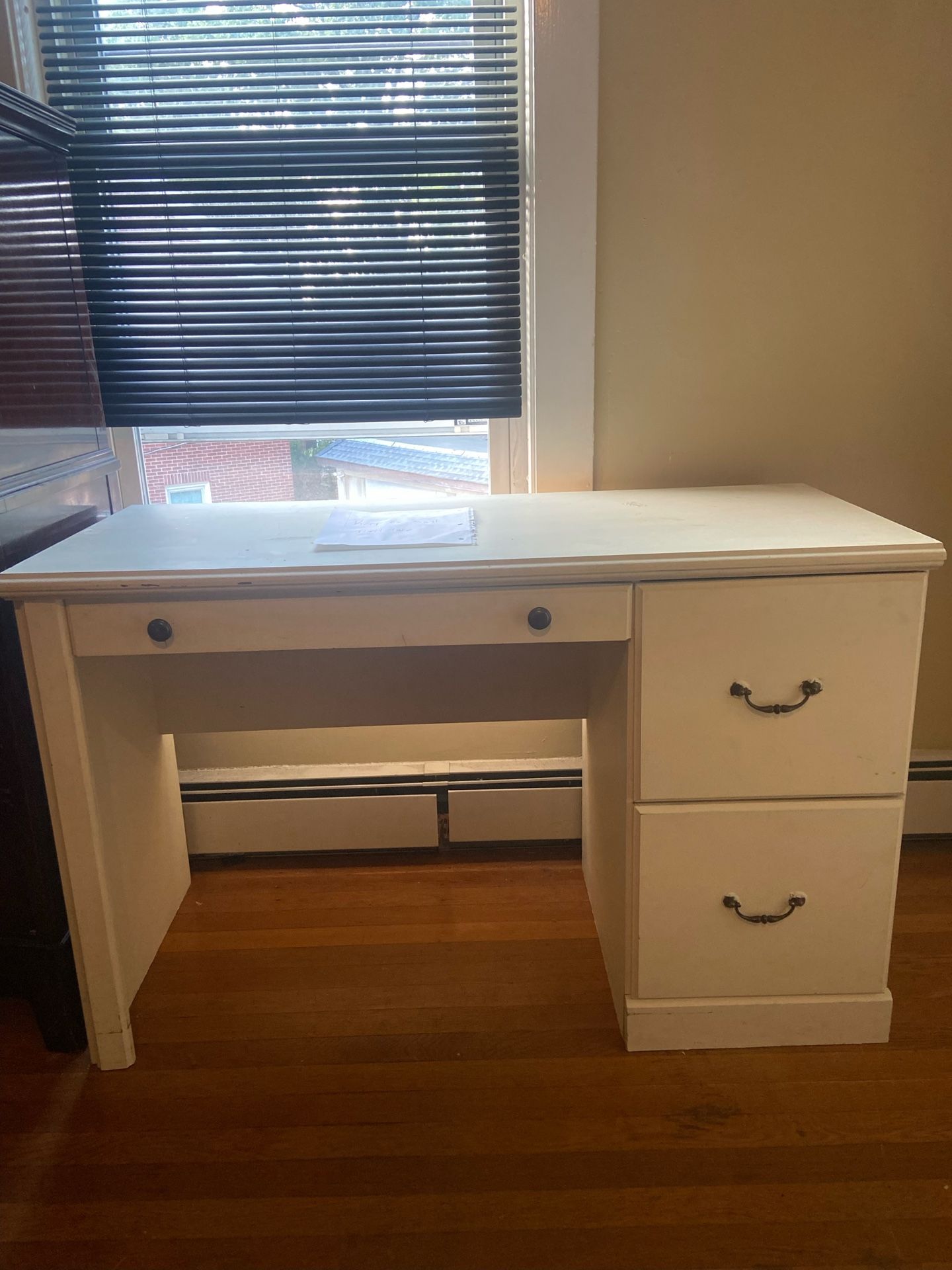 White Desk And Brown Dresser