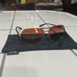 Woman’s Rose gold Framed Oakley Sunglasses