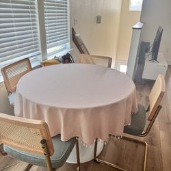 Round dining table and 4 chairs for sale!