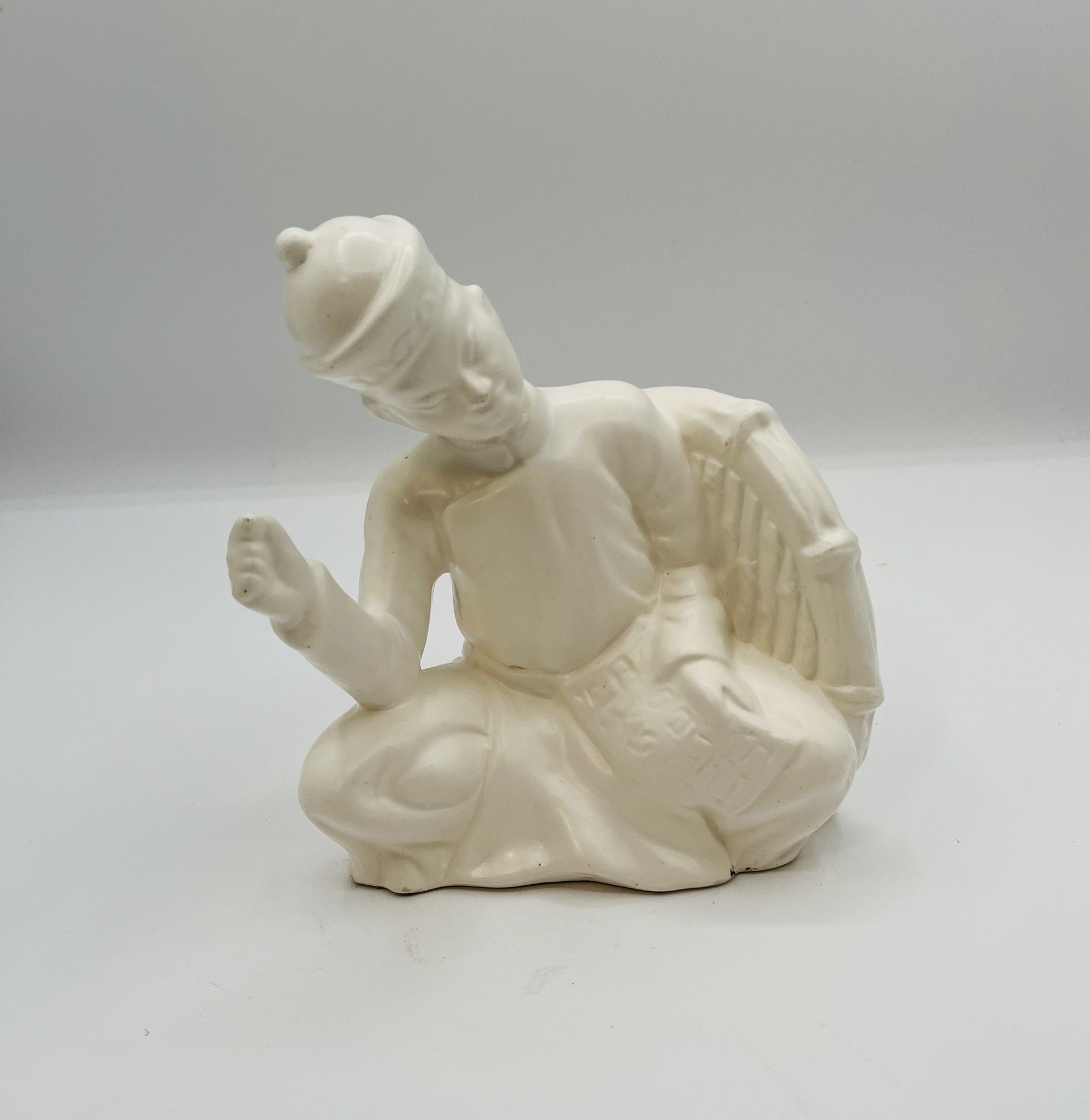 Cream Ceramic Figurine