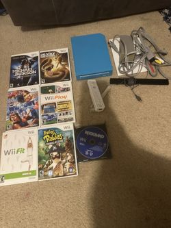 Blue Nintendo Wii Console With 7 Games