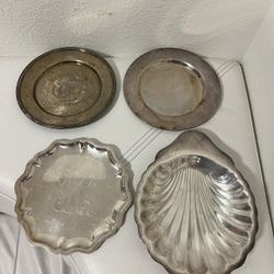 lot of 4 silver plated plates in good condition