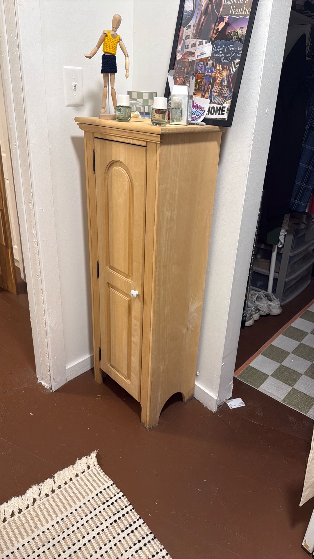 Small 3-shelf wooden storage cabinet