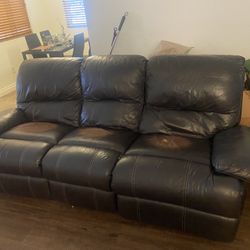 Medium Sized Reclinable Leather Couch 