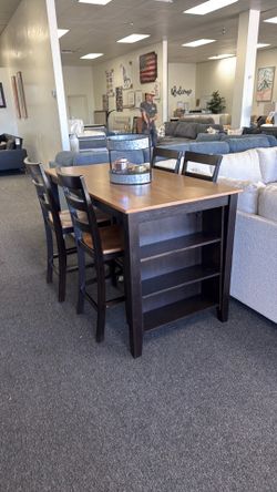 Dining set by Ashley furniture counter height with 4 stools