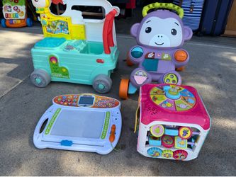 Learning activities toys and walker. $35 for all. Pick up only bonanza and lamb