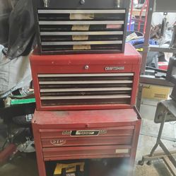 3 tool boxes and tools
