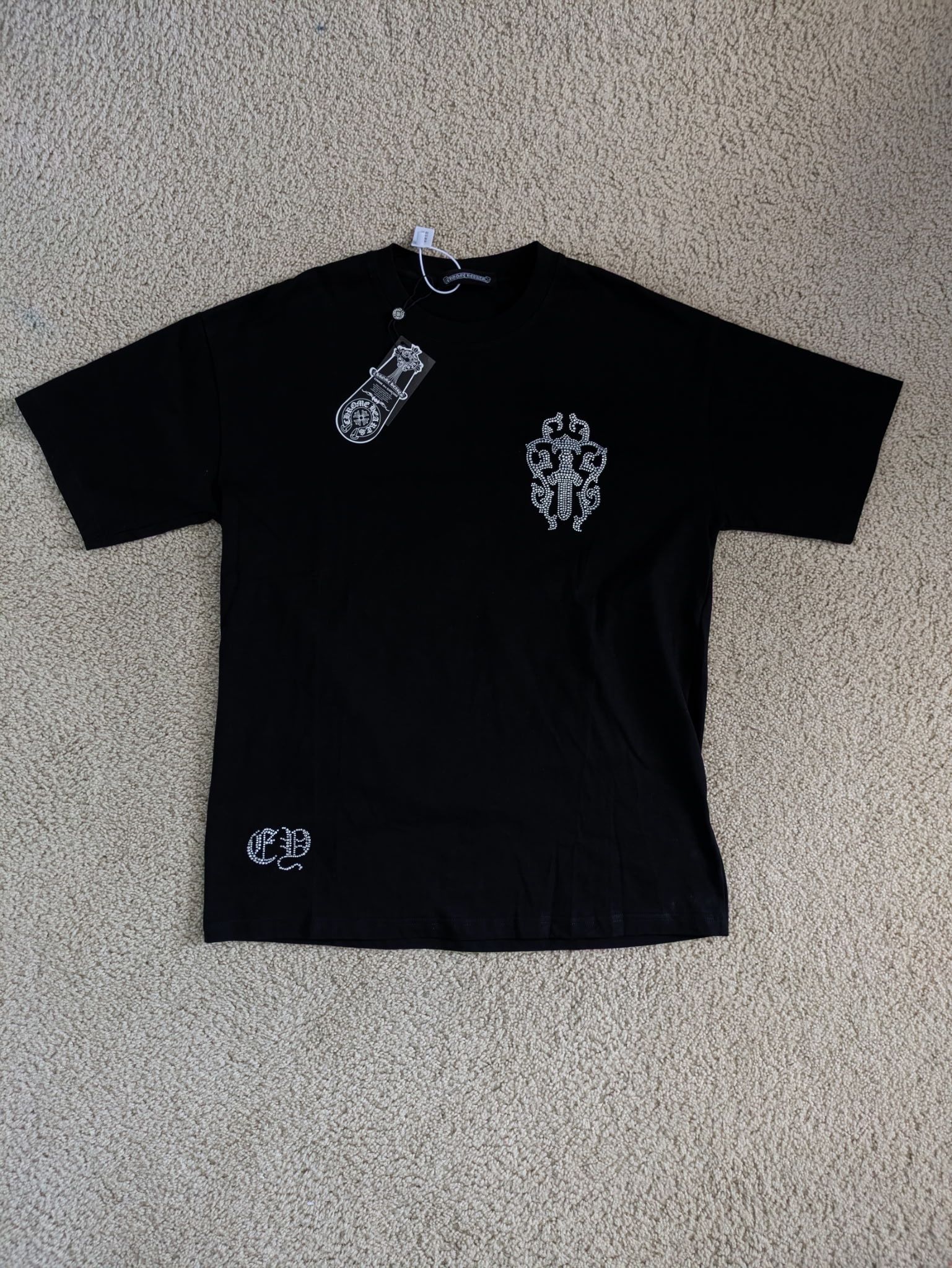 Brand New with tags and bag size large CH tee shirt