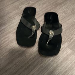 Black Gucci Flip Flops With Silver Gucci Gs 