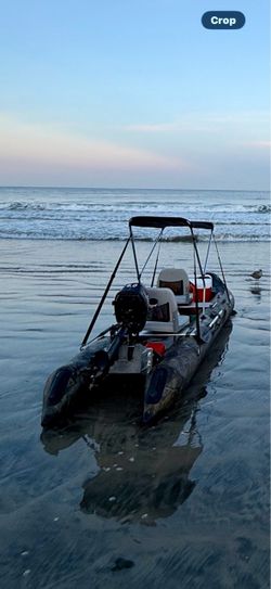 Inflatable 2 person boat/kayak w/ 7HP motor