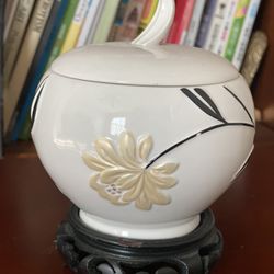 Fine Ceramic Bowl With Lid Including A Wood Base